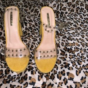 Size 10 clear strap gold studded heel. Never worn.